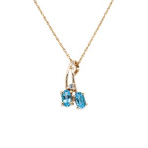 Estate Piece: 14k Yellow Gold Blue Topaz and Diamond Pendant