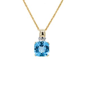Estate Piece: 10k Two Tone Gold Blue Topaz and Diamond Pendant