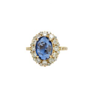 Estate Piece: 18k Yellow Gold Sapphire and Diamond Halo Ring